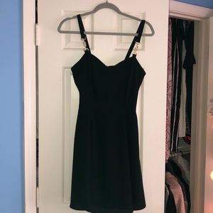 beautiful black dress with gold detail